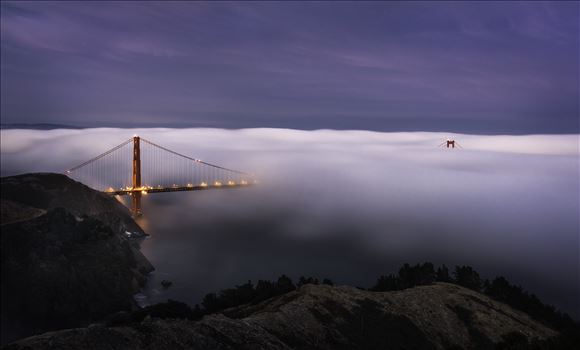 Twilight Fog - Low fog engulfs the Golden Gate Bridge.