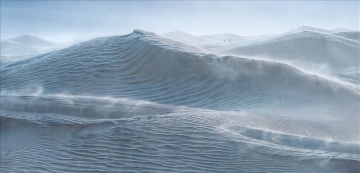 Rough Seas - Mesquite Dunes at blue hour during a wind storm with 30 mph sustained winds and 50-60 mph gusts. The dunes looked like a storm tossed sea especially the large dune which appears to be a cresting wave and the blowing sand is reminiscent of sea spray.